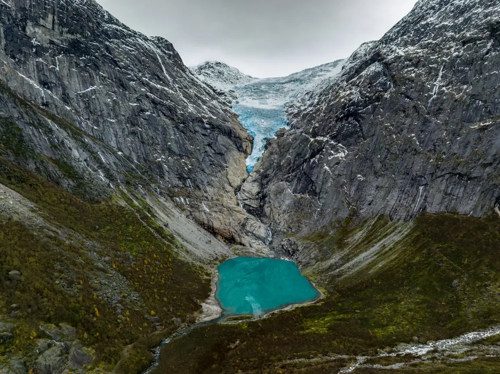 Briksdalsbreen and its turquoise glacier lake in Olden