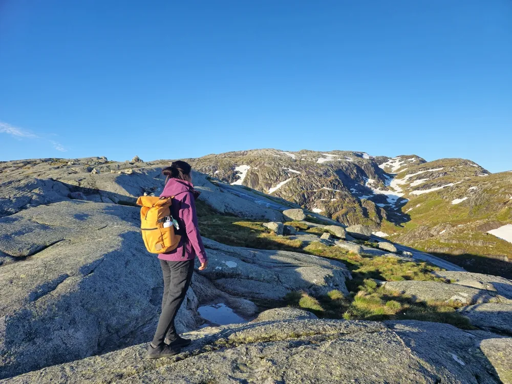 Hiker above Lysefjorden on the route to Kjerag