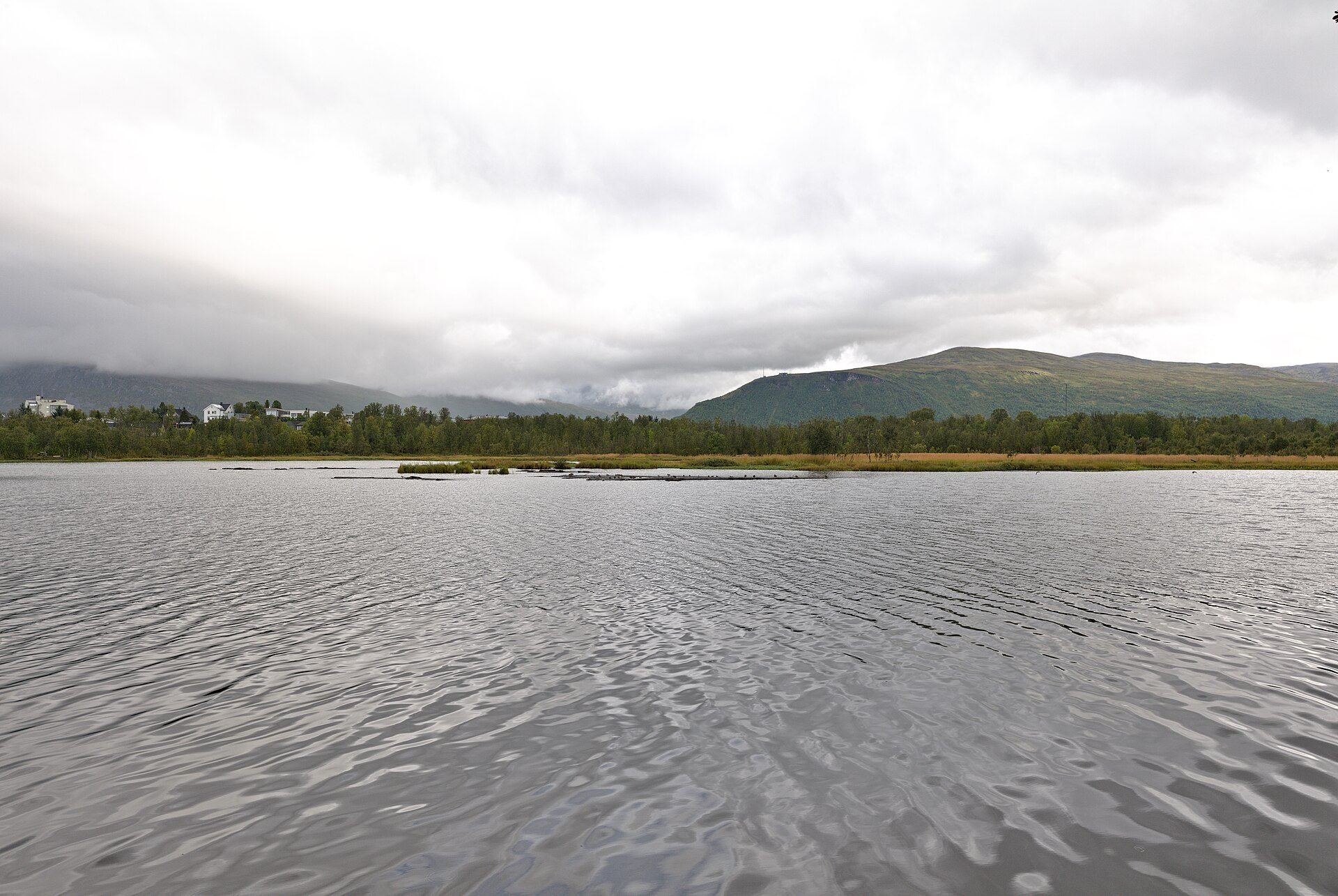 Open view across Prestvannet and the surrounding low mountains