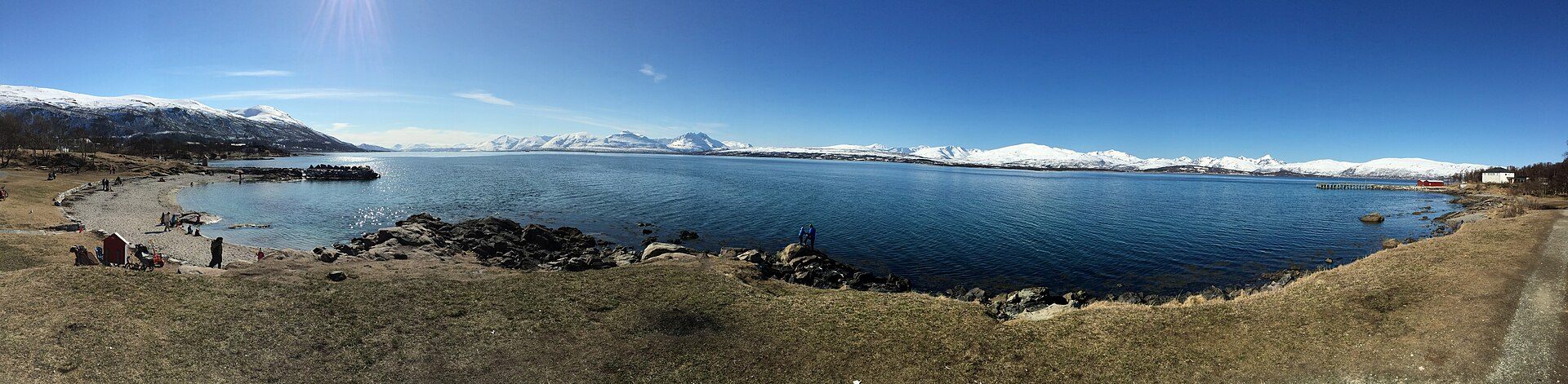 Wide coastal panorama from Telegrafbukta towards snowy mountains